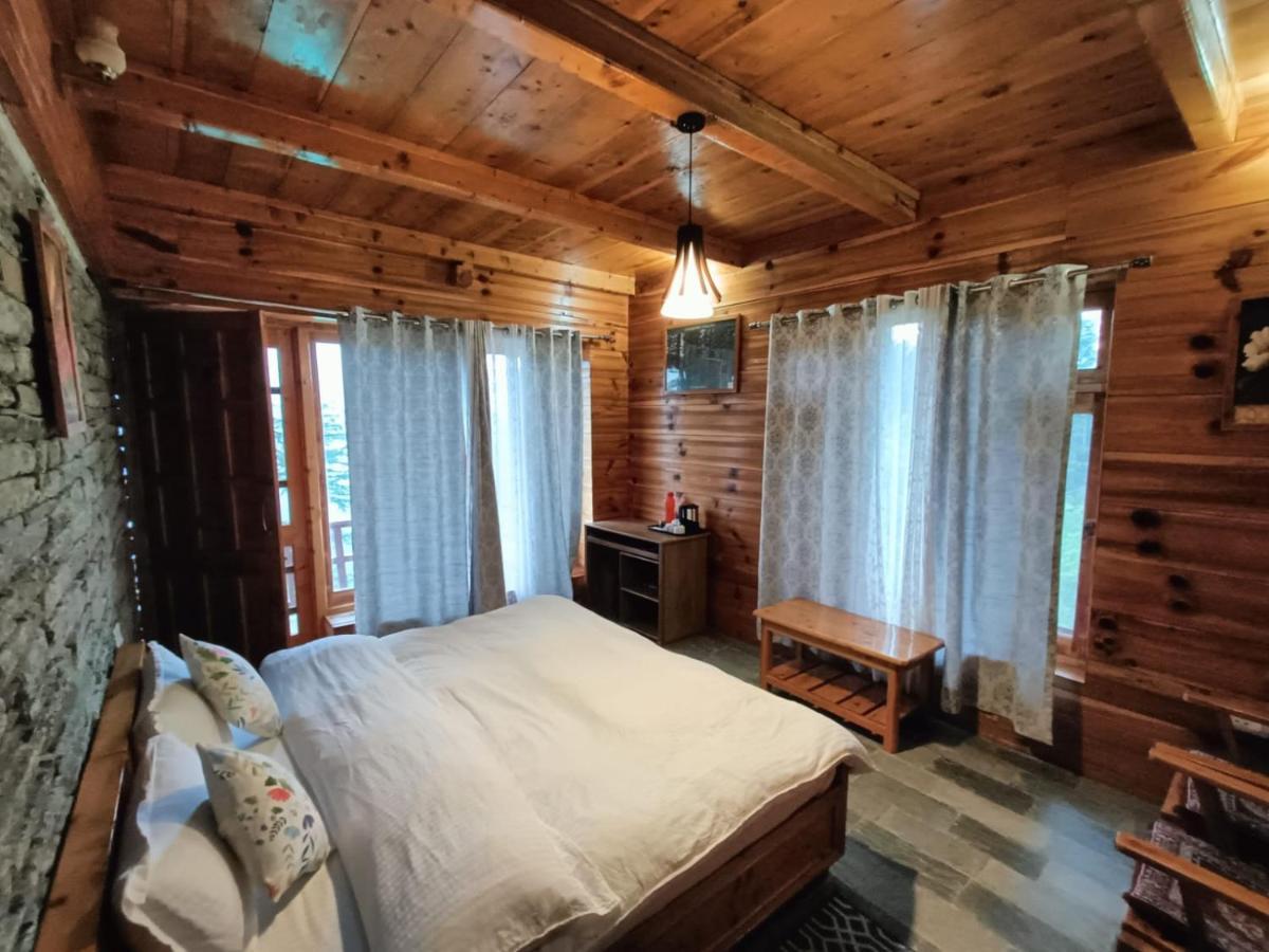 Ishan Log Huts-A Boutique Home Stay Banjār 외부 사진